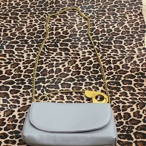 Gray and Gold Crossbody Bag with Structured Design